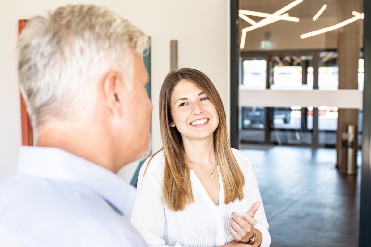 Two adessi talking and smiling